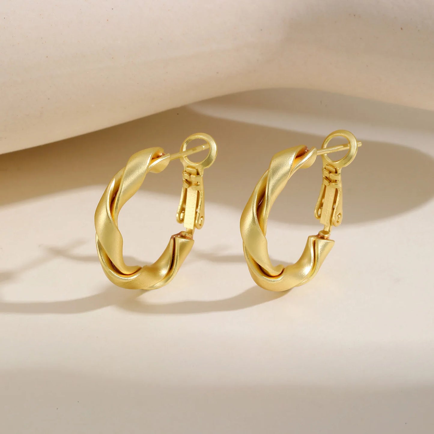 Boucles d'oreilles créoles torsadées